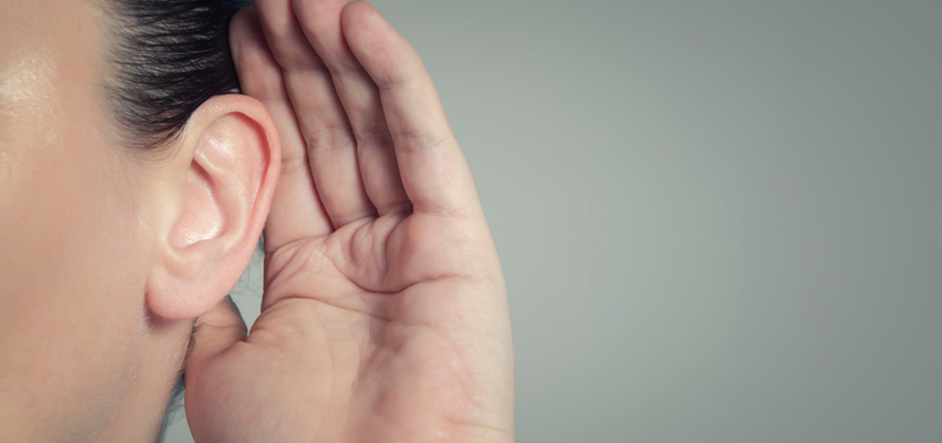 An illustration of a blue clipboard with a white checklist showing three items completed with green checkmarks
